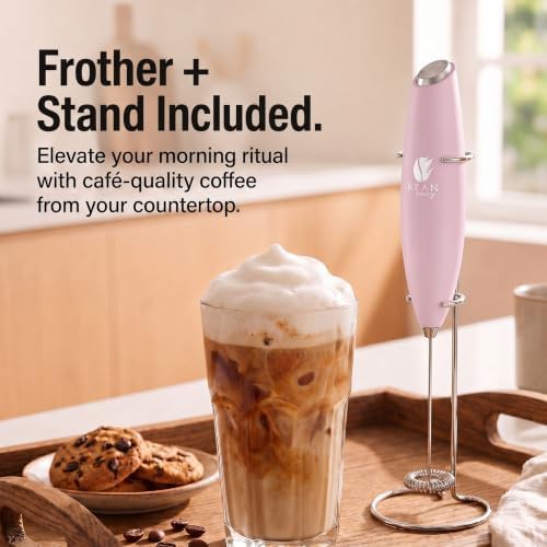 Pink handheld milk frother with stand — photo 3
